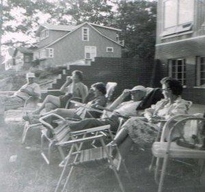 While the kids swam, the adults would sit in lawn chairs on the back porch at the Wolf Lake house and catch up on gossip.